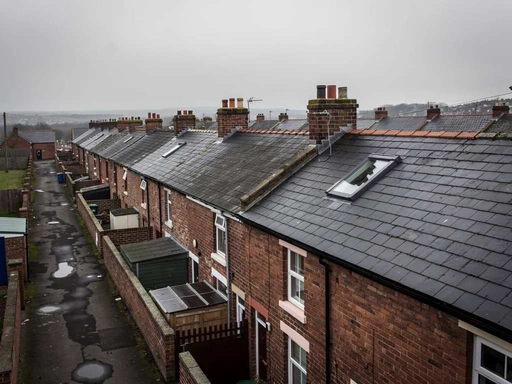 Back lanes between rows of brick terraces seen from above